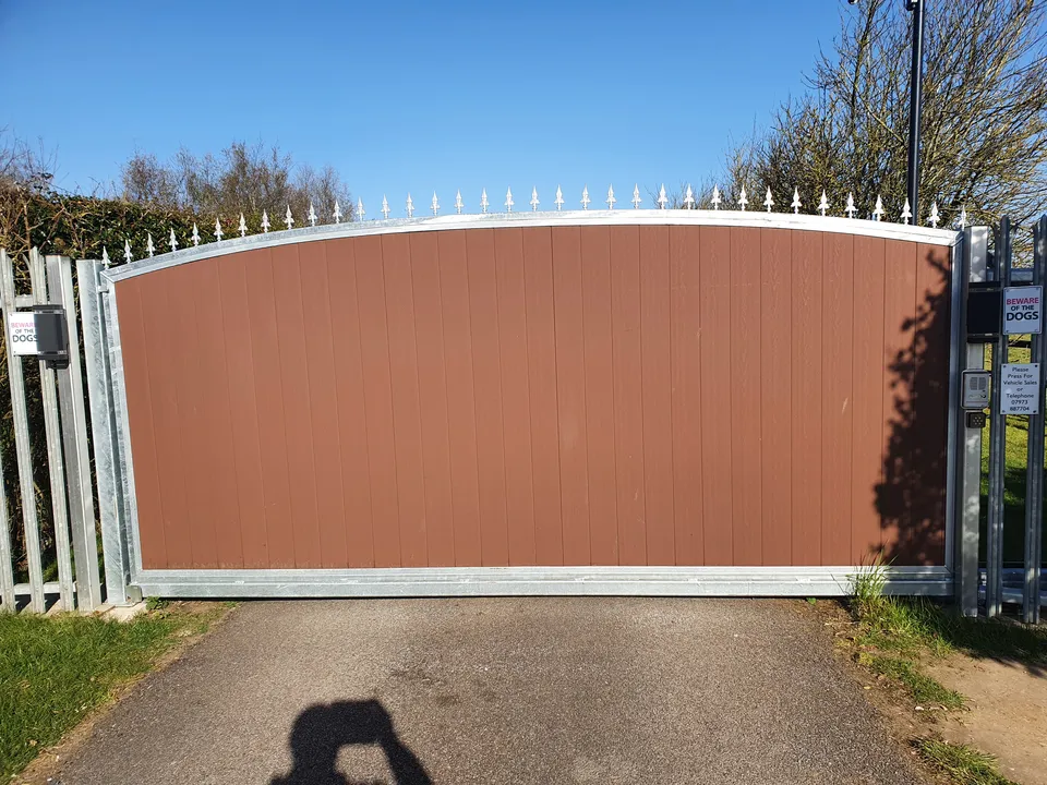 Black cantilever sliding gate installed at Craig's property in Luton